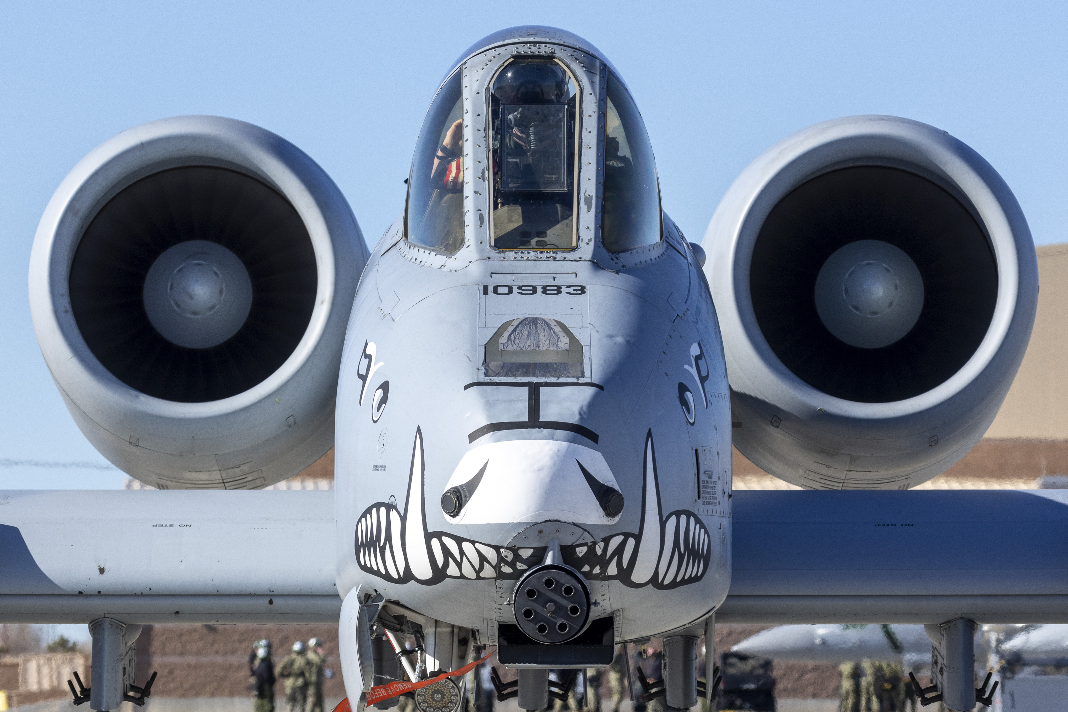Image shows the nose paint of a United States aircraft on the airbase.